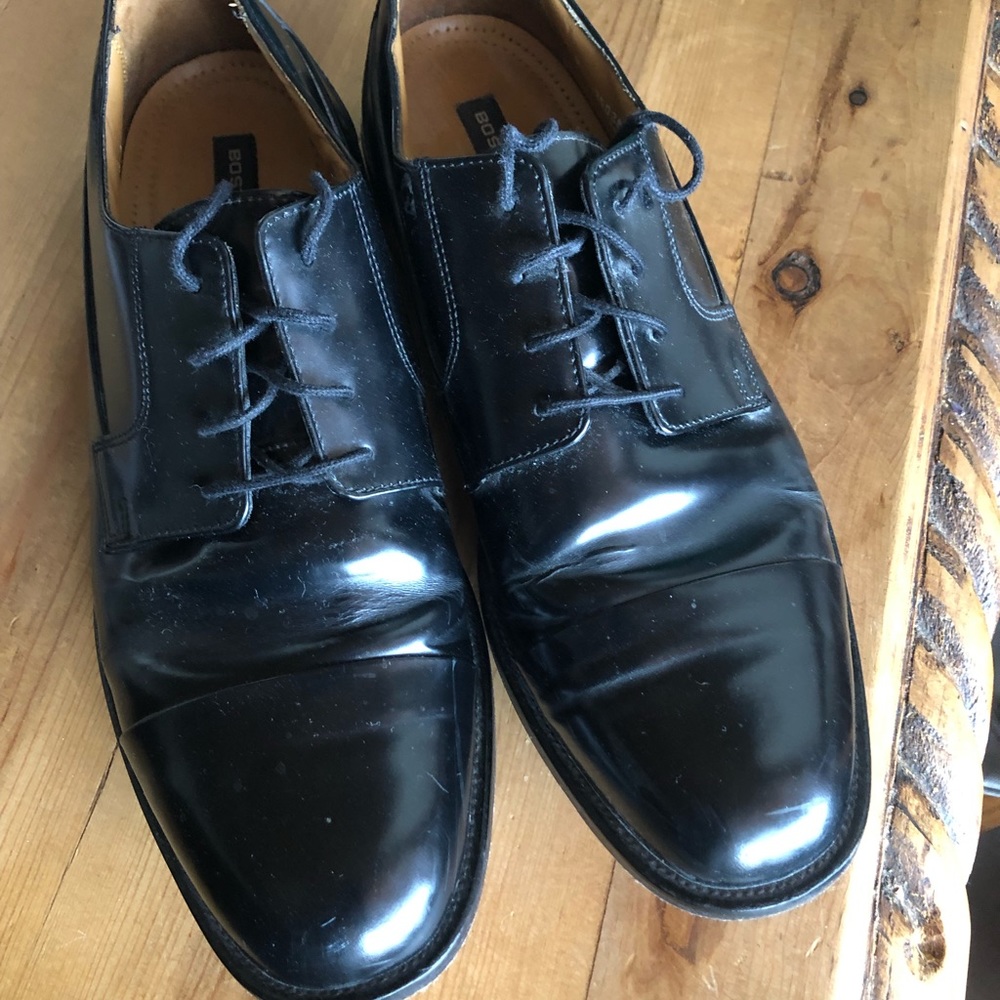 Black dress shoes with cap toe